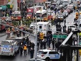 Fusillade dans le métro de New York: La piste terroriste écartée pour l'instant, vaste chasse à l'homme en cours